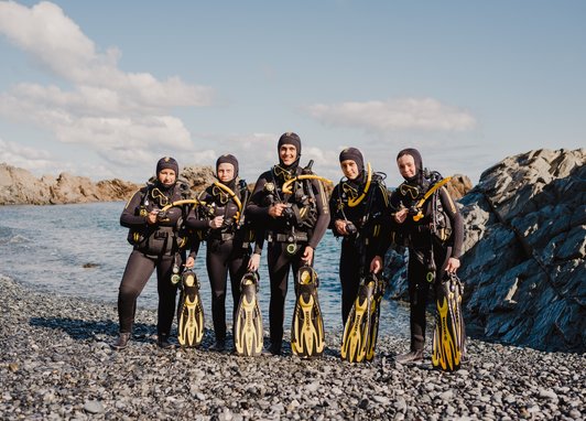 Dive Project Cornwall divers standing in a line