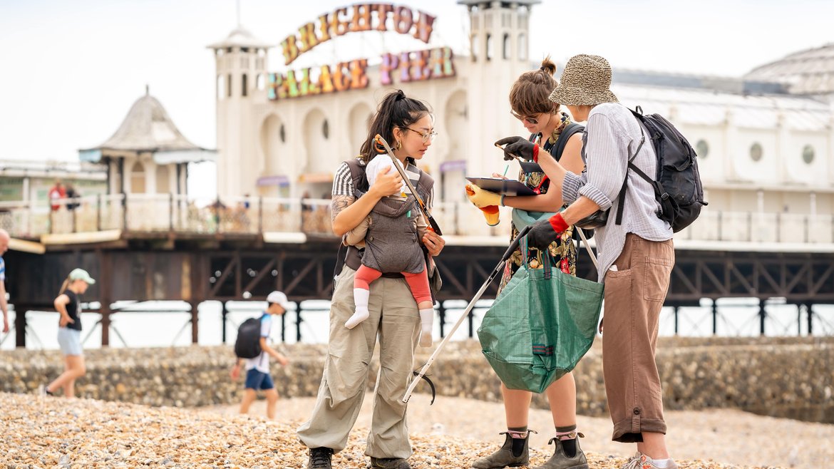 A group of volunteers taking part in the Great British Beach Clean at Brighton Beach