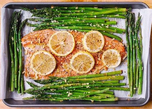 Baked rainbow trout with lemon, black pepper, and garlic