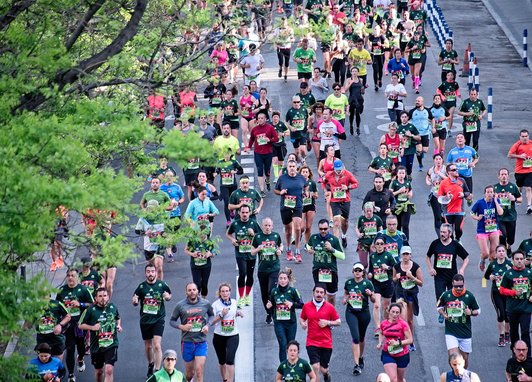 A large group of people participating in a marathon