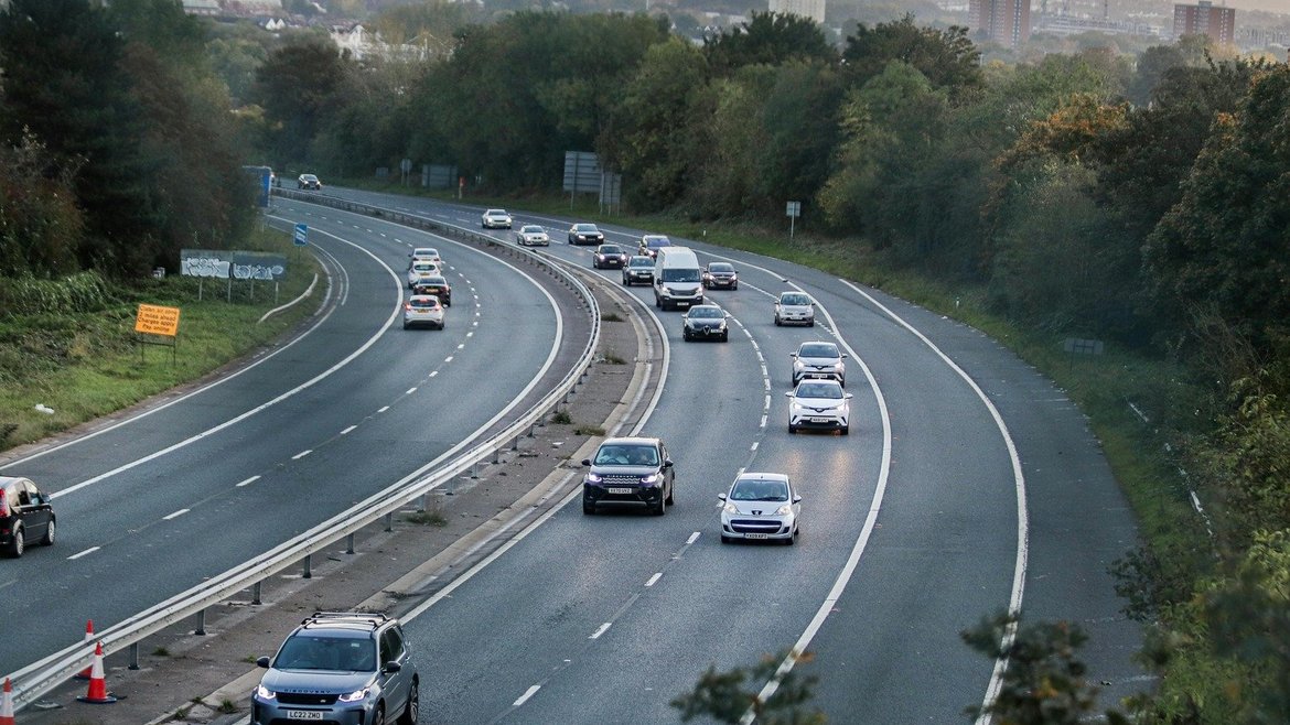 Cars are photographed on a motorway