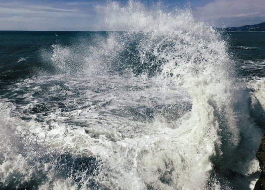 Waves crashing in open ocean.